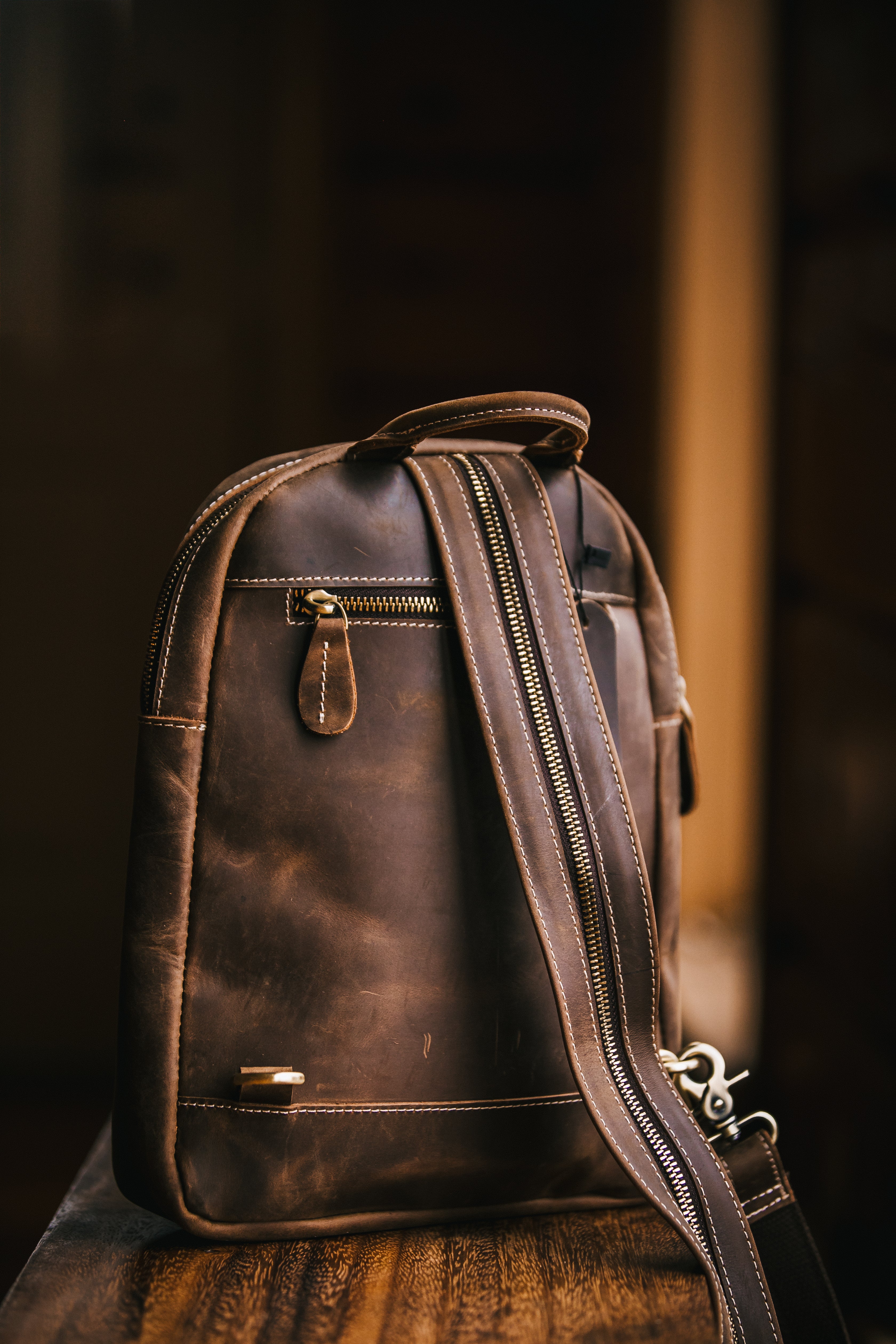 brown leather crossbody backpack Sling Bag | Genuine Full Grain Leather Crossbody Bag which opens into an interior with a zip pocket MKF Collection Romana Vegan Leather